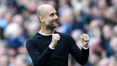 HLV Pep Guardiola giờ có thể tập trung tối đa để lên kế hoạch bảo vệ danh hiệu. Ảnh: Getty Images