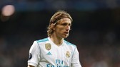 Modric dường như không thể cùng Real ra sân đối đầu với Atletico. Ảnh: Getty Images