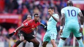 Paul Pogba (trái) đã chơi đầy nỗ lực trong màn ngược dòng trước Newcastle. Ảnh: Getty Images