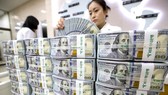 Thách thức vị thế đồng USD Thách thức vị thế đồng USD