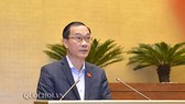 Ông Vũ Hồng Thanh, Chủ nhiệm Ủy ban Kinh tế của Quốc hội thay mặt Ủy ban Thường vụ Quốc hội (UBTVQH) trình bày Báo cáo giải trình, tiếp thu dự thảo Luật