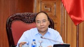 Prime Minister Nguyen Xuan Phuc chairs a meeting to evaluate cooperation with the EU in Hanoi on April 14. (Photo: VNA)