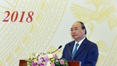 Prime Minister Nguyen Xuan Phuc addresses national teleconference between the Government and localities