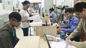 Gỡ bất cập biên chế hành chính cho TPHCM