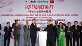 Nutifood and Japanese beverage producer Asahi set joint venture to produce nutritional products for Vietnamese children. (Photo: SGGP)