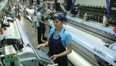 Dệt xuất khẩu tại một đơn vị trong nước. Ảnh: CAO THĂNG