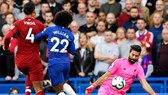 Alisson đã hòa nhập nhanh để trở thành chỗ dựa cho Liverpool. Ảnh: Getty Images