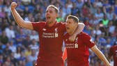James Milner (phải) là chỗ dựa tinh thần cho đồng đội. Ảnh: Getty Images