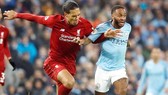 Virgil van Dijk (trái) và Liverpool thật sự đã làm mọi cách có thể để ngăn Man.City. Ảnh: Getty Images