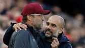 HLV Jurgen Klopp một lần nữa phải về sau đồng nghiệp Pep Guardiola. Ảnh: Getty Images