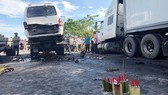 Hiện trường một vụ tai nạn làm 13 người chết, 4 người bị thương xảy ra hôm 30-7 trên QL1A đoạn tuyến tránh Vĩnh Điện (xã Điện Minh, thị xã Điện Bàn, tỉnh Quảng Nam)
