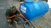 Dawaco đặt các bồn nước tạm cho người dân sử dụng