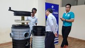Sản phẩm hố ga nhựa chống triều cường, ngăn mùi hôi được giới thiệu tại CESTI. Ảnh: CHÂU TUẤN