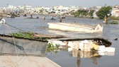 Sạt lở đã cuốn trôi hàng trăm ngôi nhà ở ĐBSCL mỗi năm. Ảnh: CAO THĂNG