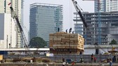 Châu Á tăng trưởng nhưng đề phòng nguy cơ thoái vốn