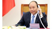 Thủ tướng Nguyễn Xuân Phúc chúc tết Thủ tướng Lào và Thủ tướng Campuchia