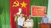 Truy tặng Huân chương Dũng cảm cho dân quân Phạm Duy Quang
