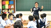 Học sinh Trường Tiểu học Lương Định Của (quận 3) tập trung trong sáng tựu trường 20-8