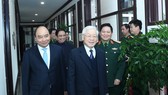 Tổng Bí thư, Chủ tịch nước Nguyễn Phú Trọng; Thủ tướng Chính phủ Nguyễn Xuân Phúc cùng các đại biểu dự hội nghị. Ảnh VGP
