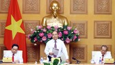 Thủ tướng Nguyễn Xuân Phúc phát biểu tại Hội nghị liên tịch thường niên giữa Chính phủ và Ủy ban Trung ương Mặt trận Tổ quốc Việt Nam. Ảnh: TTXVN