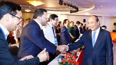 Thủ tướng Nguyễn Xuân Phúc và các đại biểu tham dự hội nghị Xúc tiến đầu tư tỉnh Quảng Ngãi năm 2019. Ảnh: TTXVN