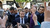 May, Macron strike border security deal at UK summit