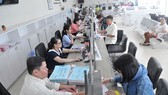 Triển khai thu thuế điện tử toàn bộ ở TPHCM và Hà Nội Triển khai thu thuế điện tử toàn bộ ở TPHCM và Hà Nội