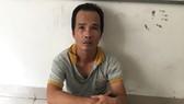 Hưng tại cơ quan công an. Ảnh: CHÍ THẠCH