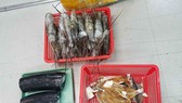 Tang vật thu giữ. Ảnh: Đ.N.