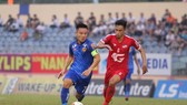 Vũ Minh Tuấn thắng Đinh Thanh Trung trong cuộc so tài giữa hai thủ lĩnh trong cuộc đối đầu trện sân Tam Kỳ. Ảnh: Viết Định
