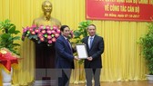 Head of the Party Central Committee’s Organisation Commission Pham Minh Chinh (L) and Transport Minister Truong Quang Nghia (Source: VNA)