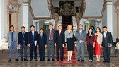 HCM City and IFC officials pose for a photo (Photo: VNA)