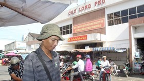 Kim Thai is selling lottery tickets (Photo: SGGP)