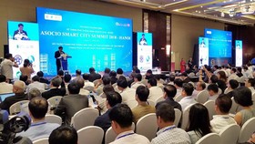 The Chairman of the Hanoi People’s Committee Nguyen Duc Chung delivered his opening speech at the ASOCIO Summit. Photo by Tran Binh