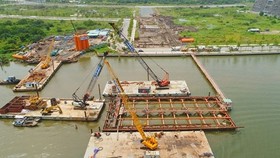 Sluggish site clearance leads to delay of Thu Thiem 2 Bridge