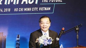 The Minister of Science and Technology Chu Ngoc Anh delivered a presentation in the conference. Photo by MC
