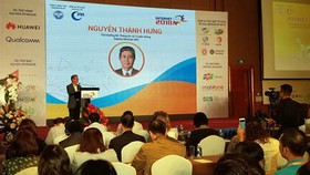 Deputy Minister Nguyen Thanh Hung delivered his presentation in the conference Internet Day 2018. Photo by TB