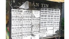 Bảng thông tin khu phố thành nơi quảng cáo tín dụng đen