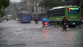 Vấn đề ngập nước là một trong những bức xúc của người dân TPHCM . Ảnh: HOÀNG HÙNG