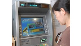 Banks must ensure ATMs to operate smoothly and safely during the Tet holiday (Photo: SGGP)