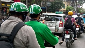 A Grab bike on Ly Thuong Kiet Street in Hanoi (Photo: VNA)