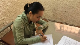 Đối tượng Nguyễn Thị Thắm tại cơ quan công an