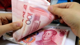 Chỉnh sửa quy định về thanh toán bằng đồng nhân tệ tại biên giới