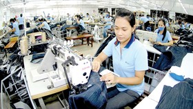 Ngành dệt may đang có mức tăng trưởng ấn tượng Ảnh: CAO THĂNG