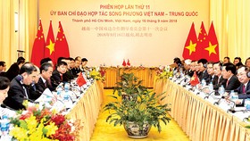 Đồng chí Phạm Bình Minh, Ủy viên Bộ Chính trị, Phó Thủ tướng Chính phủ, Bộ trưởng Bộ Ngoại giao và Ủy viên Quốc vụ, Bộ trưởng Bộ Ngoại giao Trung Quốc Vương Nghị đồng chủ trì Phiên họp lần thứ 11 Ủy ban Chỉ đạo hợp tác song phương Việt Nam - Trung Quốc.