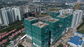 Bất động sản sẽ gặp khó khi vốn vay bị kiểm soát chặt Ảnh: CAO THĂNG