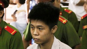 Bị cáo Nguyễn Hữu Tình tại phiên tòa. Ảnh: TTXVN