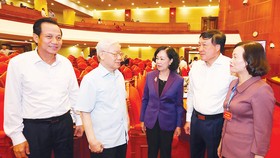Tổng Bí thư Nguyễn Phú Trọng với các đại biểu dự hội nghị. Ảnh: TTXVN