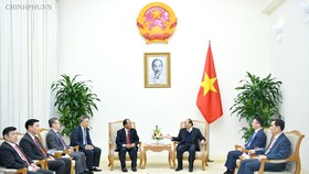 Thủ tướng Nguyễn Xuân Phúc tại tiếp Bộ trưởng Tư pháp Lào Xaysy Santivong. Ảnh: VGP