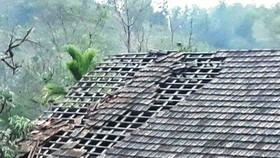 A hailstorm blows away the roof of a house in central Nghe An Province -Photo: VNS
